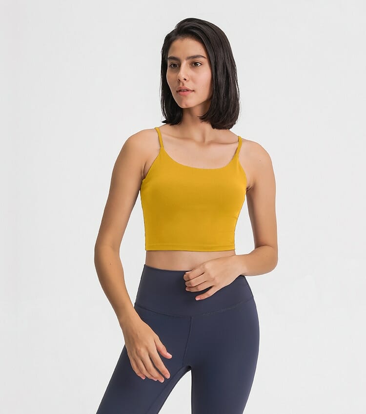 yellow strappy back light impact sports bra