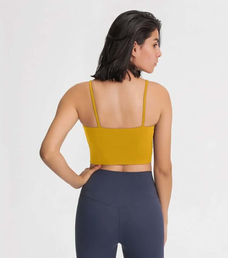 yellow padded strappy back light impact sports bra