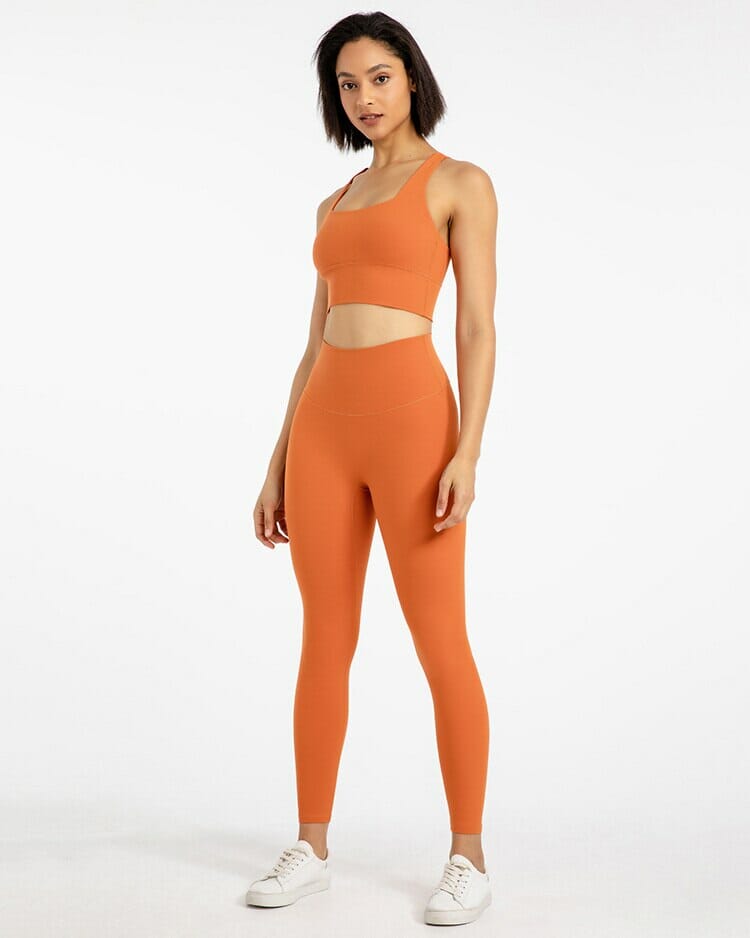 orange high waisted leggings and sports bra set