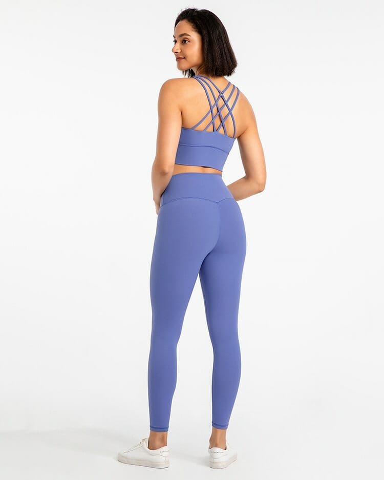 conjunto de leggings morados de cintura alta y sujetador deportivo