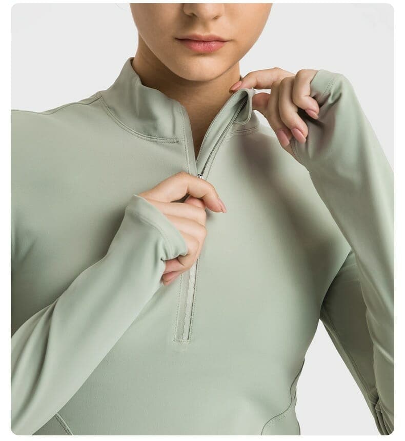 green nylon half zip jacket